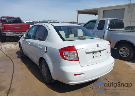 2012 Suzuki Sx4 из США, поврежденный, VIN JS2YC5A35C6300706